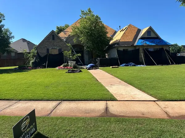 Upscale home roof replacement in progress